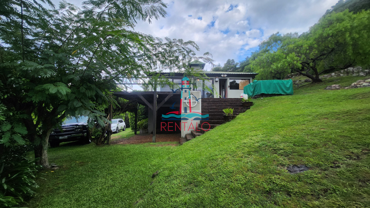 Casa ID.198 - Casa en venta 4 dormitorios en Las Cumbres vista a la Laguna del Sauce
