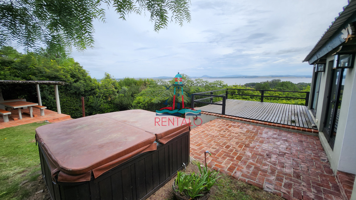 Casa ID.198 - Casa en venta 4 dormitorios en Las Cumbres vista a la Laguna del Sauce