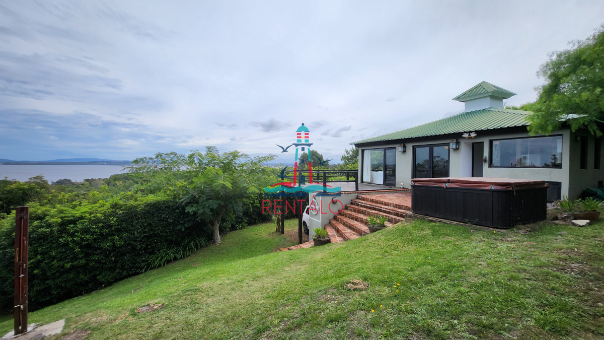 Casa ID.198 - Casa en venta 4 dormitorios en Las Cumbres vista a la Laguna del Sauce