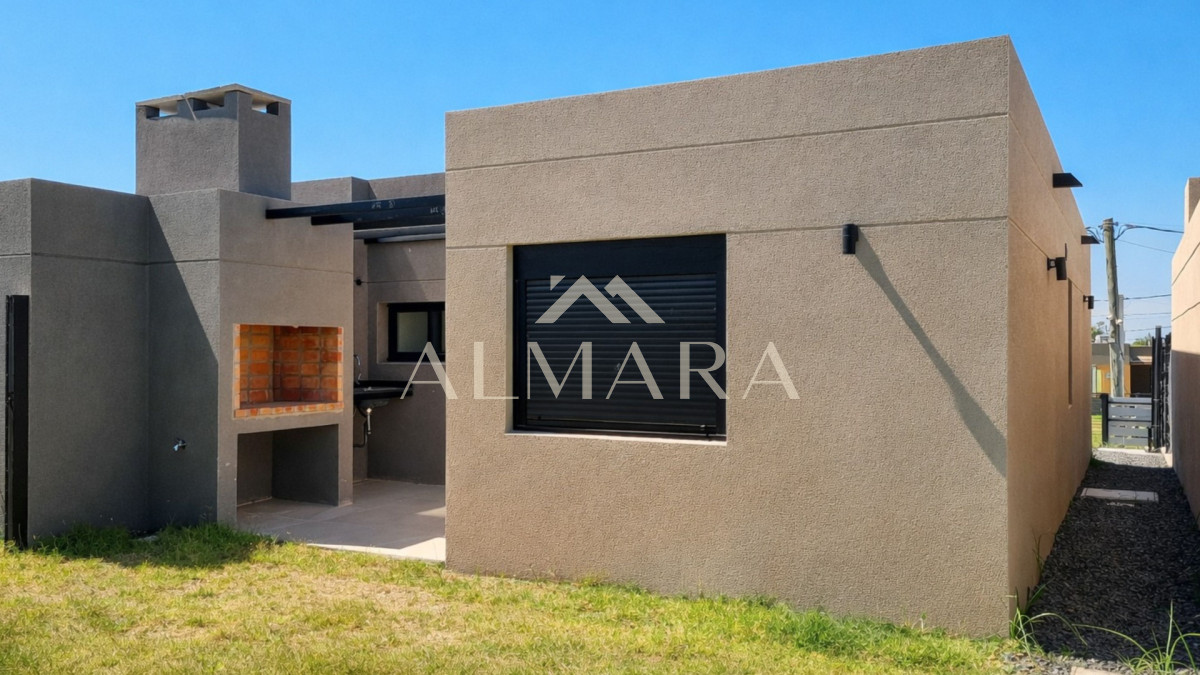 Casa ID.8 - Venta Casa a estrenar en Lagomar 2 dorm cochera y patio Ley 18.795