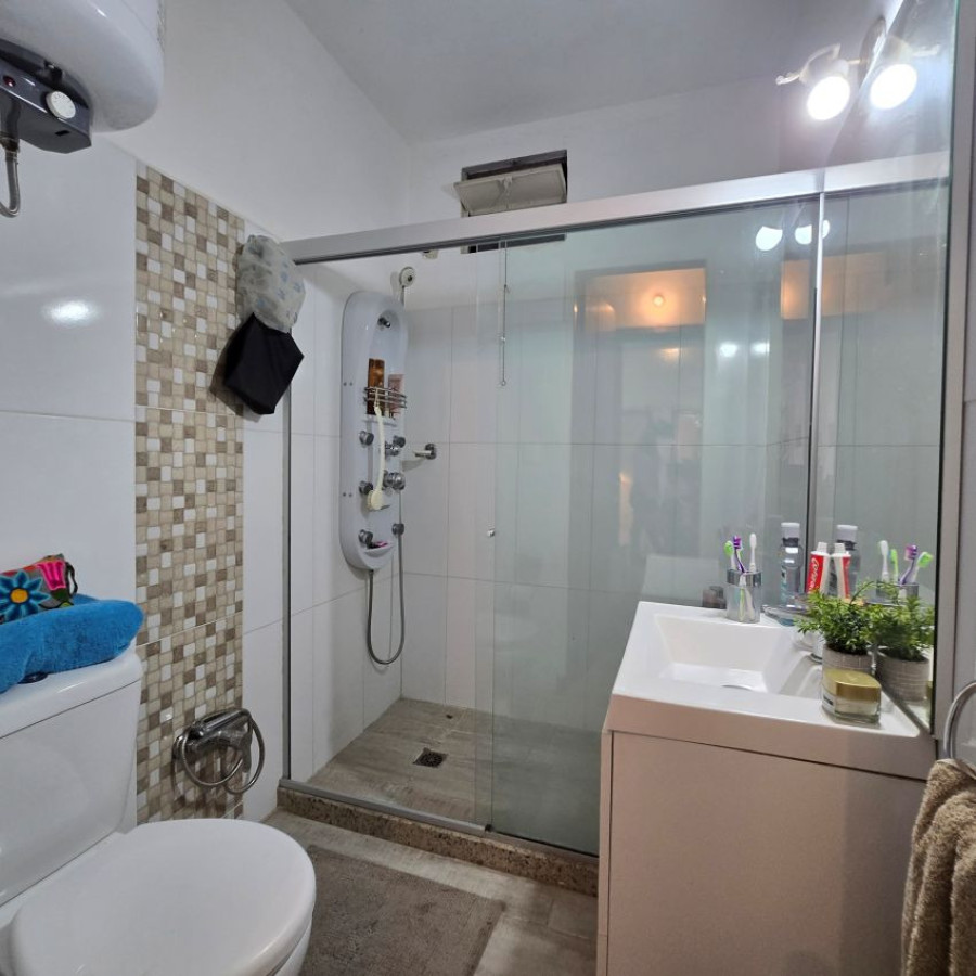 Casa ID.181 - Venta casa Malvin 2 dormitorios con barbacoa y garaje.