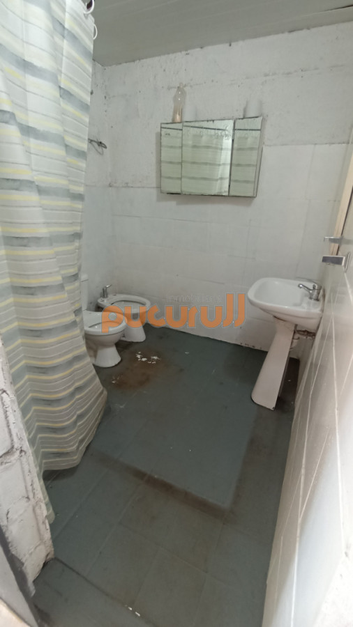 Terreno ID.2719 - SE VENDE TERRENO CON MEJORAS 