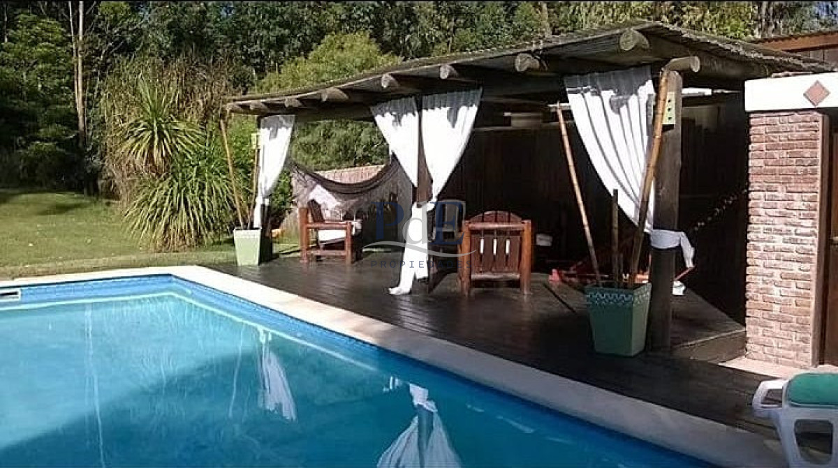 Casa en alquiler | 3 dormitorios, estufa a leña y 1.000 m² de terreno, a 100 m del mar. Ubicación: Portezuelo, Punta del Este - Imagen 13