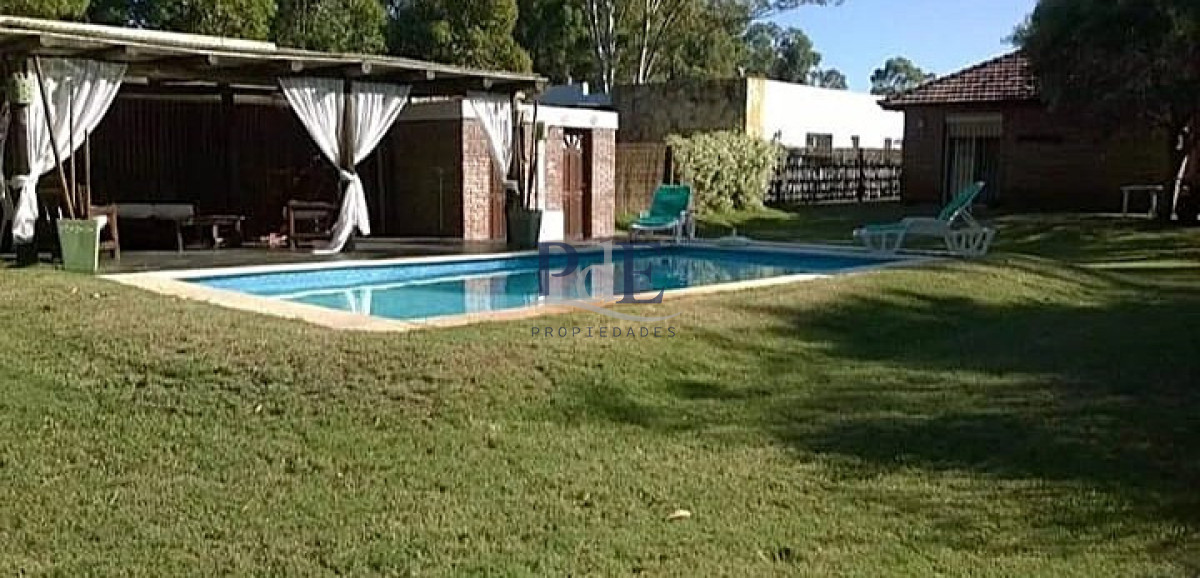 Casa en alquiler | 3 dormitorios, estufa a leña y 1.000 m² de terreno, a 100 m del mar. Ubicación: Portezuelo, Punta del Este - Imagen 15
