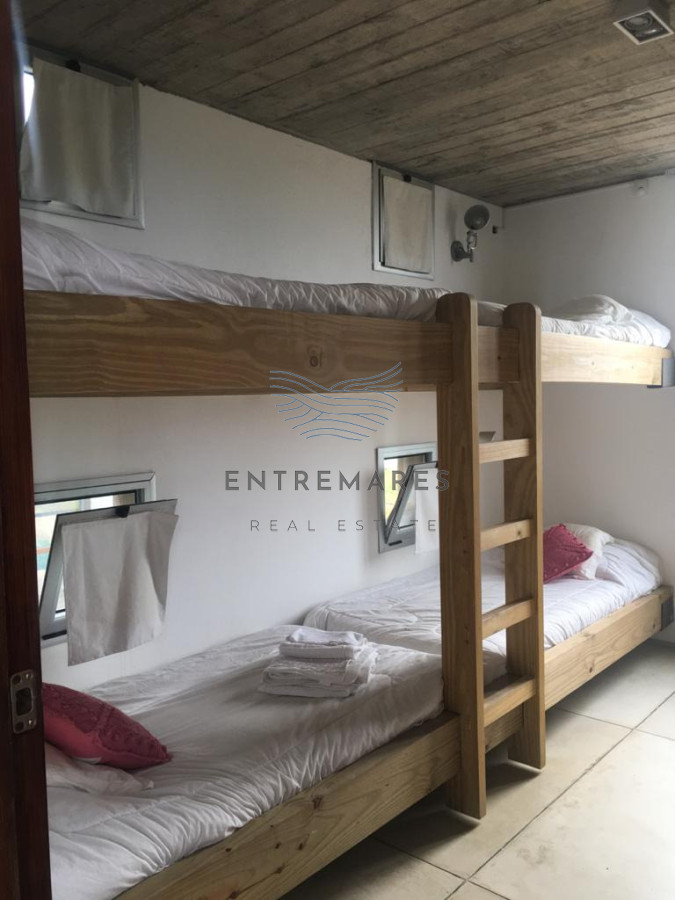 Casa ID.469 - CASA EN VENTA Y ALQUILER DE TEMPORADA. 4 SUITES. MANANTIALES FRENTE AL MAR 