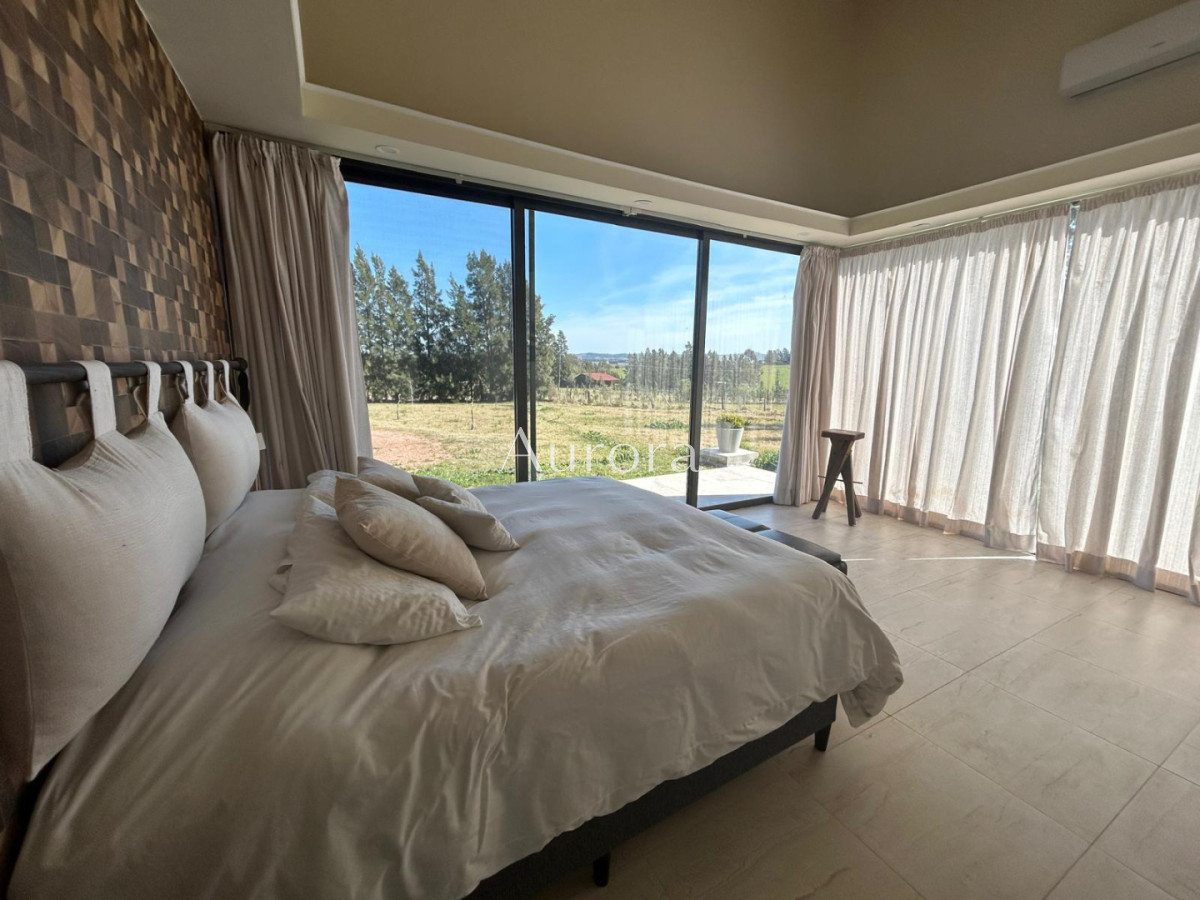 Chacra ID.82 - Chacra con casa moderna en venta.