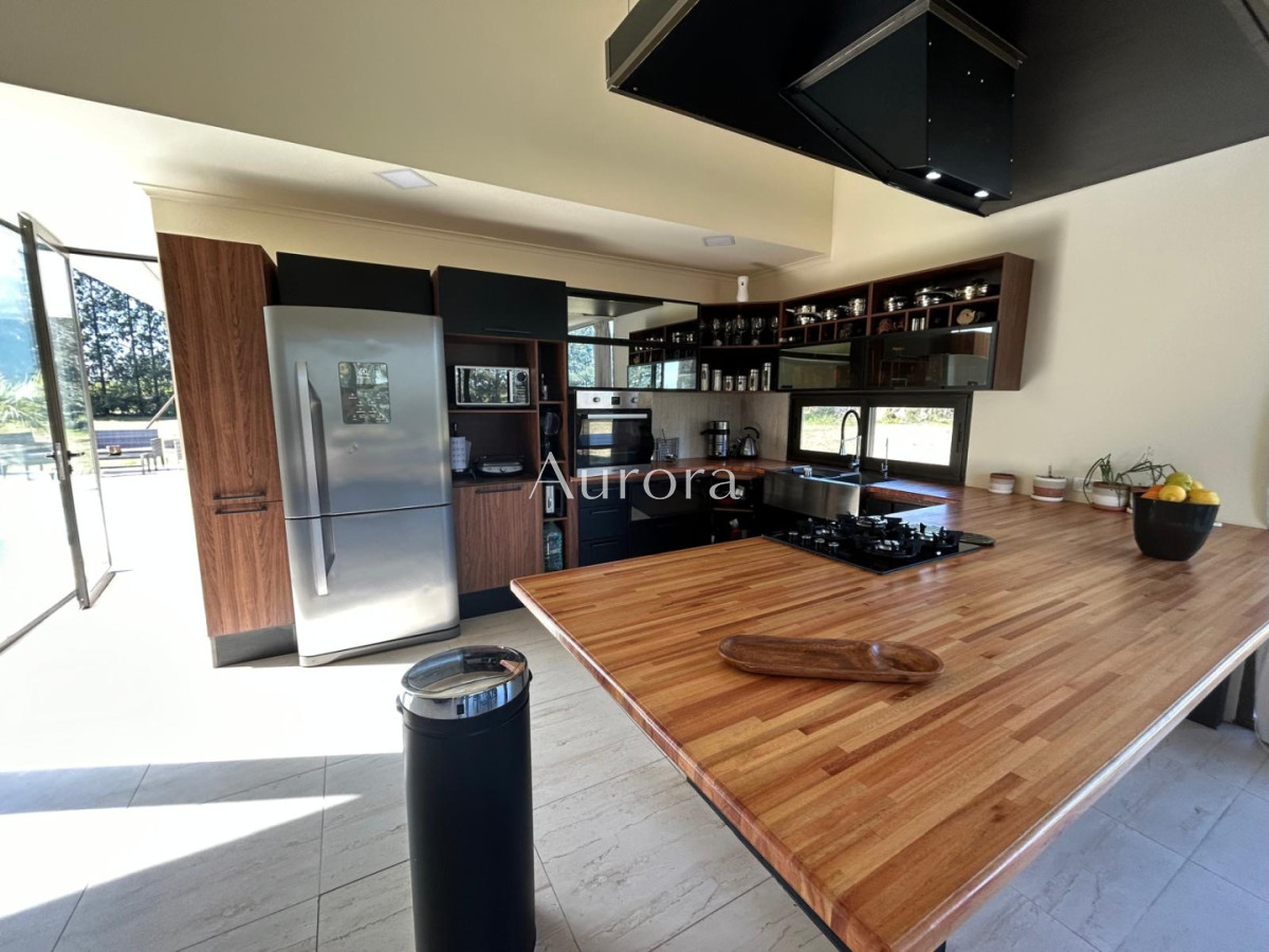 Chacra ID.82 - Chacra con casa moderna en venta.