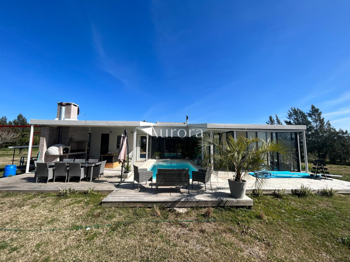 Chacra ID.82 - Chacra con casa moderna en venta.