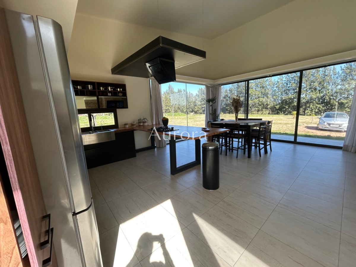 Chacra ID.82 - Chacra con casa moderna en venta.