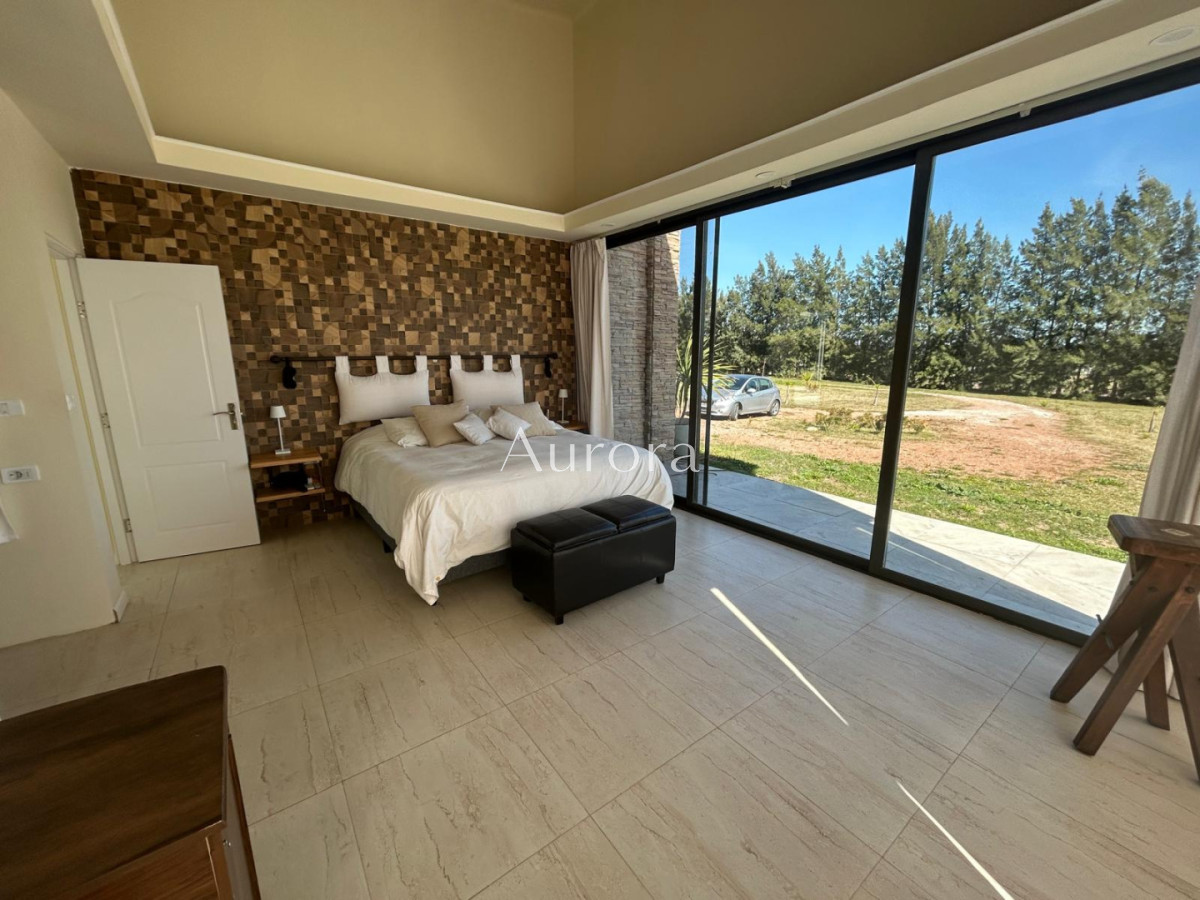 Chacra ID.82 - Chacra con casa moderna en venta.