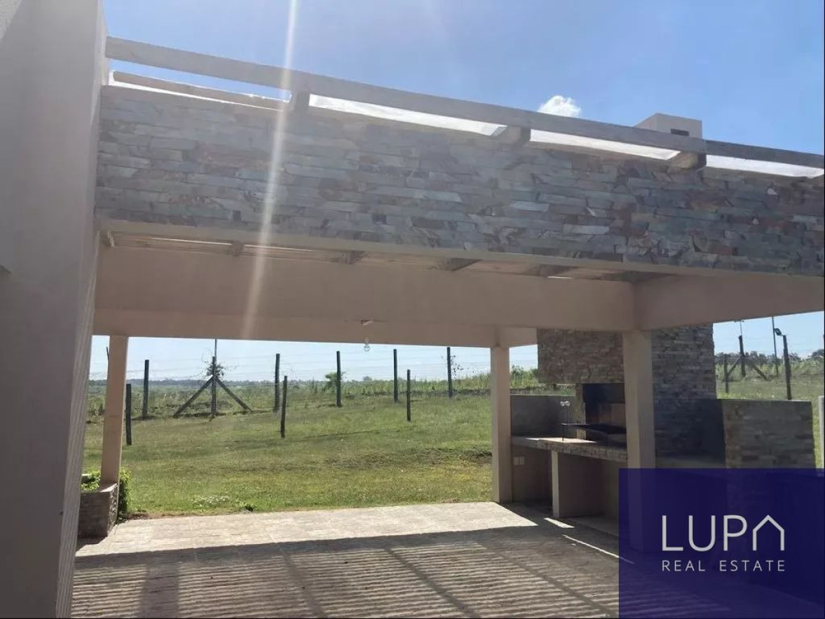 Casa ID.85420 - Casa en alquiler de 4 dormitorios c/ cochera en Barrio Colinas De Carrasco