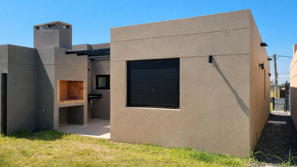 Casa ID.8 - Venta Casa a estrenar en Lagomar 2 dorm cochera y patio Ley 18.795