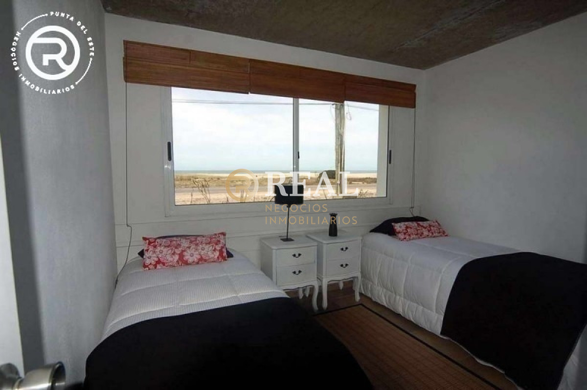 Casa ID.69 - Frente al mar con amplia barbacoa.