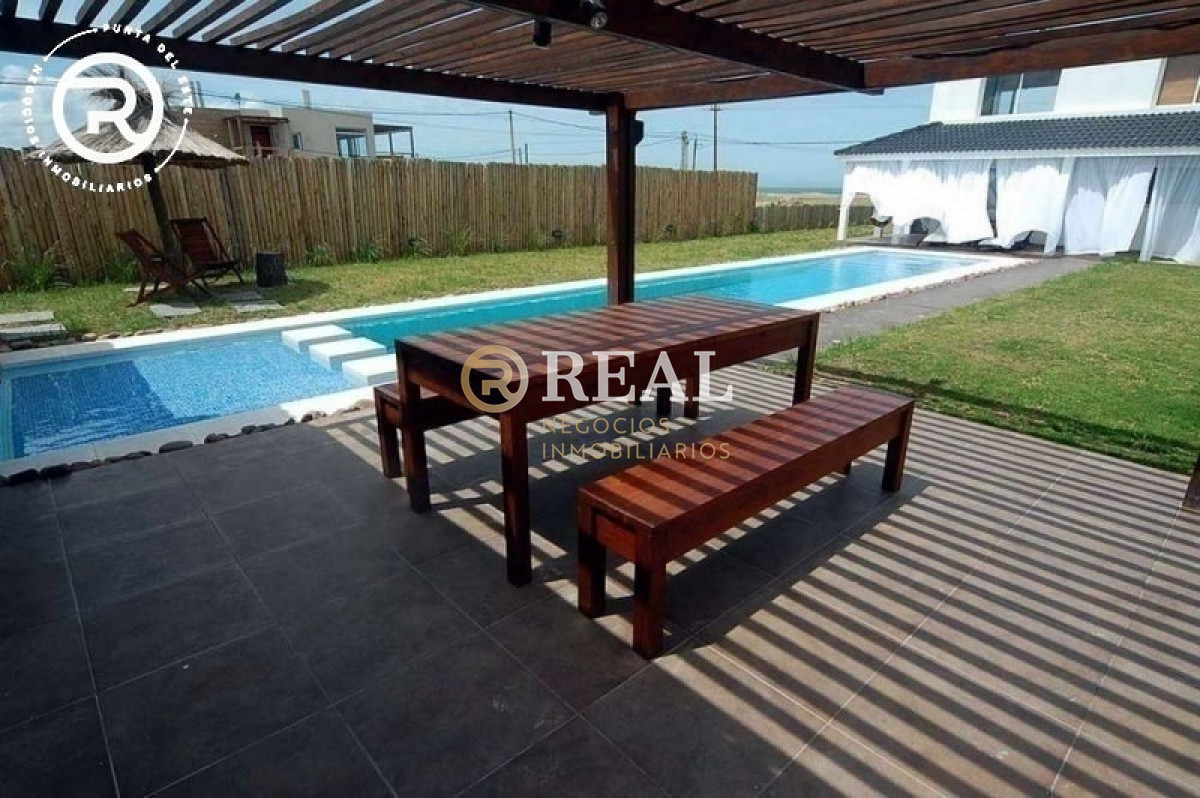 Casa ID.69 - Frente al mar con amplia barbacoa.