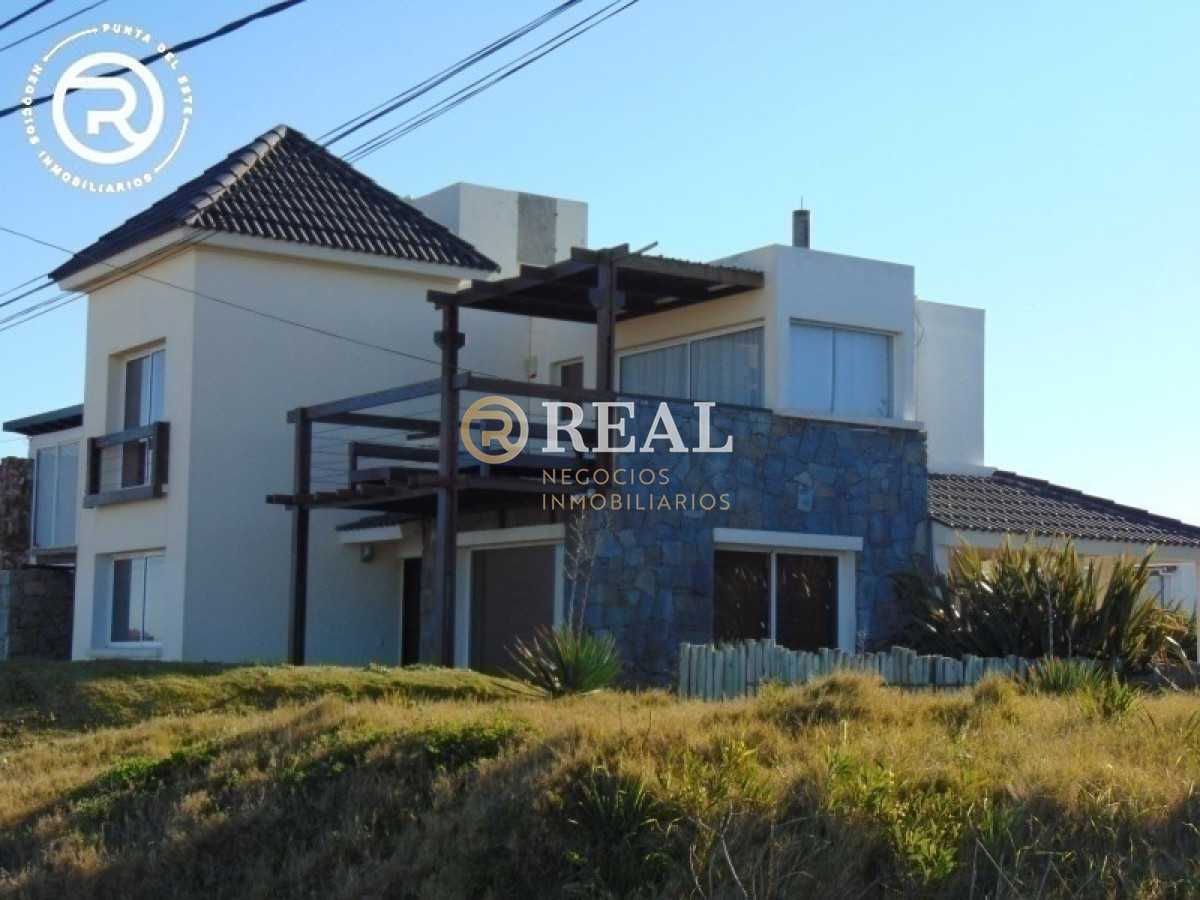Casa ID.69 - Frente al mar con amplia barbacoa.