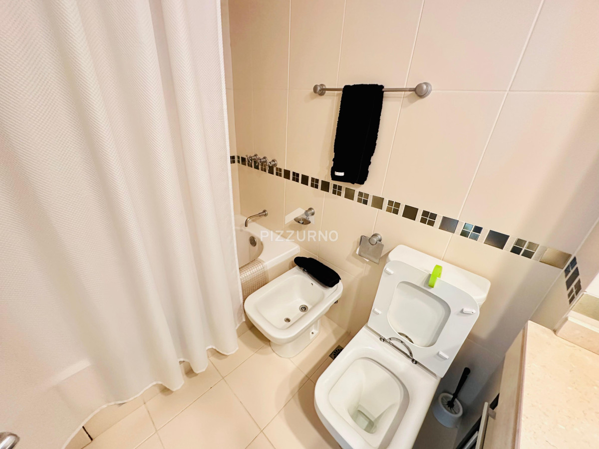 Apartamento Ref.103 - Departamento en playa mansa con parrillero propio