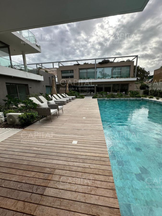Apartamento ID.40271 - Apartamento de dos dormitorios con rooftop y parrillero propio en Complejo Alive Residences, Barrio Parques 2.