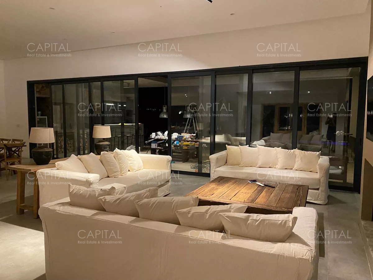 Casa ID.34319 - Casa moderna de cuatro dormitorios y dependencia de servicio, parrillero y piscina climatizada en venta en barrio privado El Quijote, La Barra