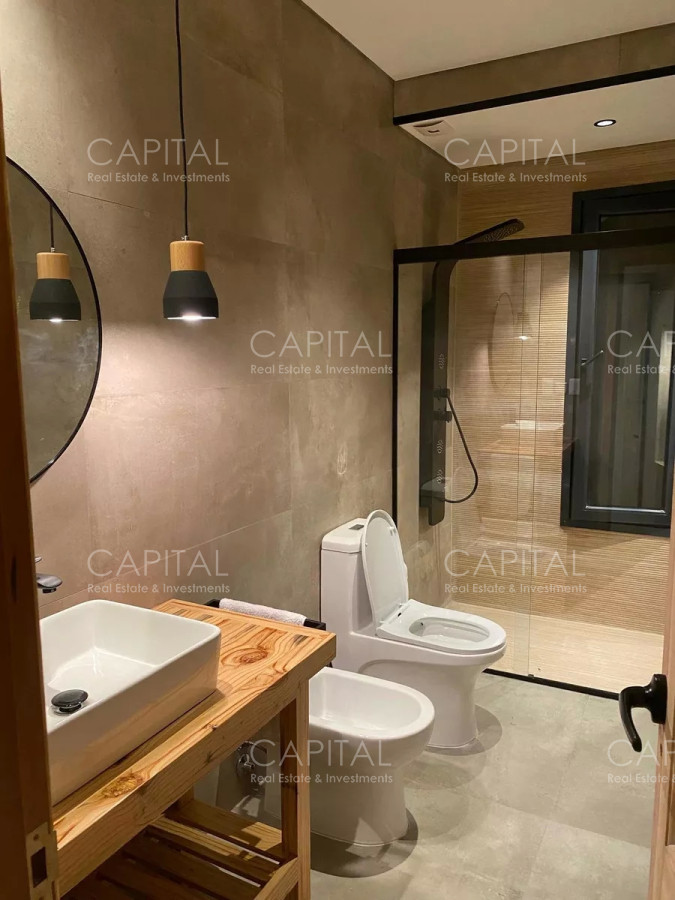 Casa ID.34319 - Casa moderna de cuatro dormitorios y dependencia de servicio, parrillero y piscina climatizada en venta en barrio privado El Quijote, La Barra