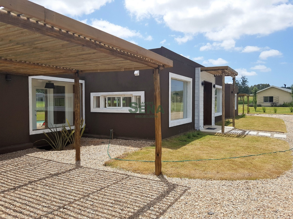 Venta de casa 3 dormitorios en la barra, 3 baños, gran parque. - GoPunta - Portal Inmobiliario de Punta del Este - Maldonado