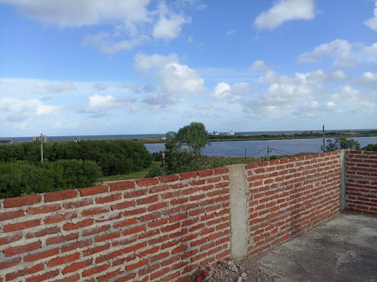Venta de casa en construcción en Sta Mónica, de 3 dormitorios, 2 baños, con vista a la laguna. - GoPunta - Portal Inmobiliario de Punta del Este - Maldonado
