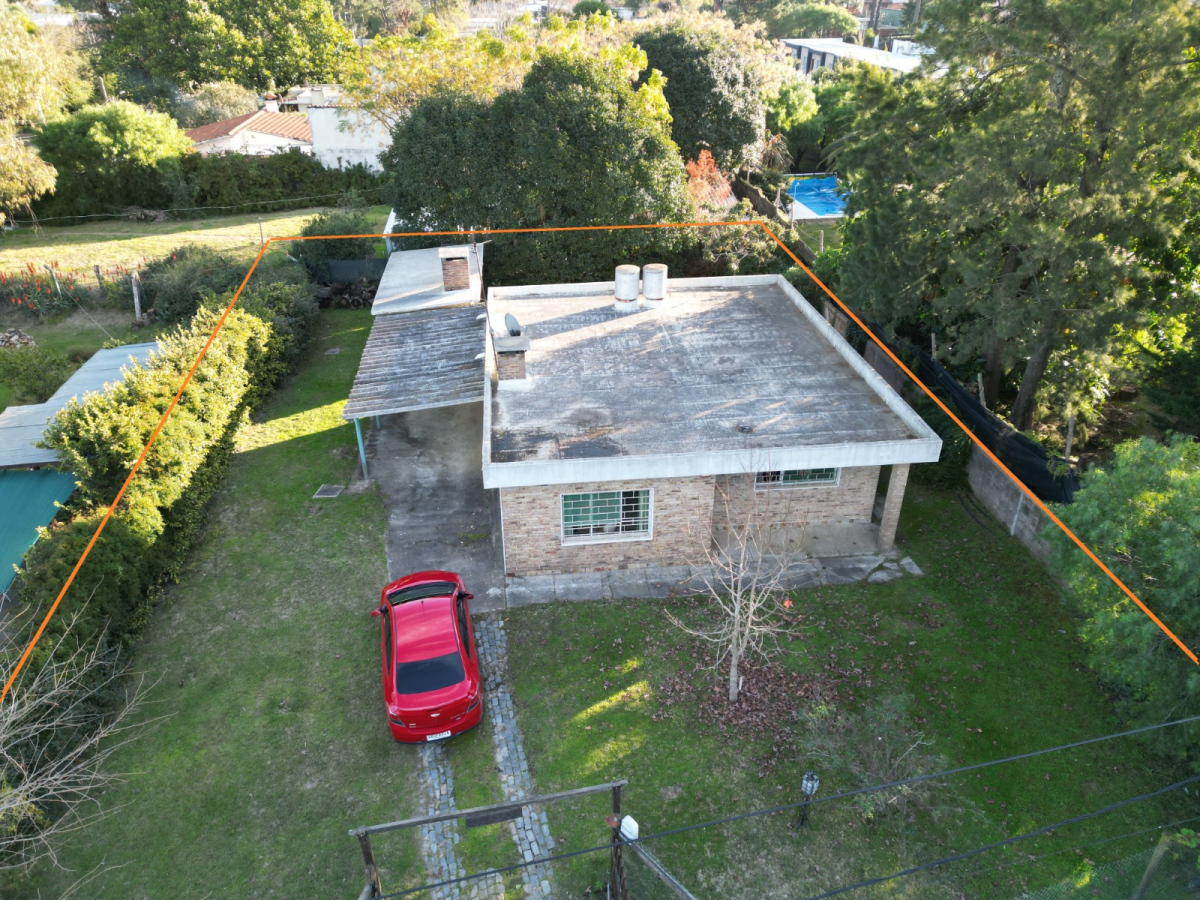  Alquiler Casa El Pinar 1 planta 2 dormitorios 2 baños fondo Cochera techada Parrillero